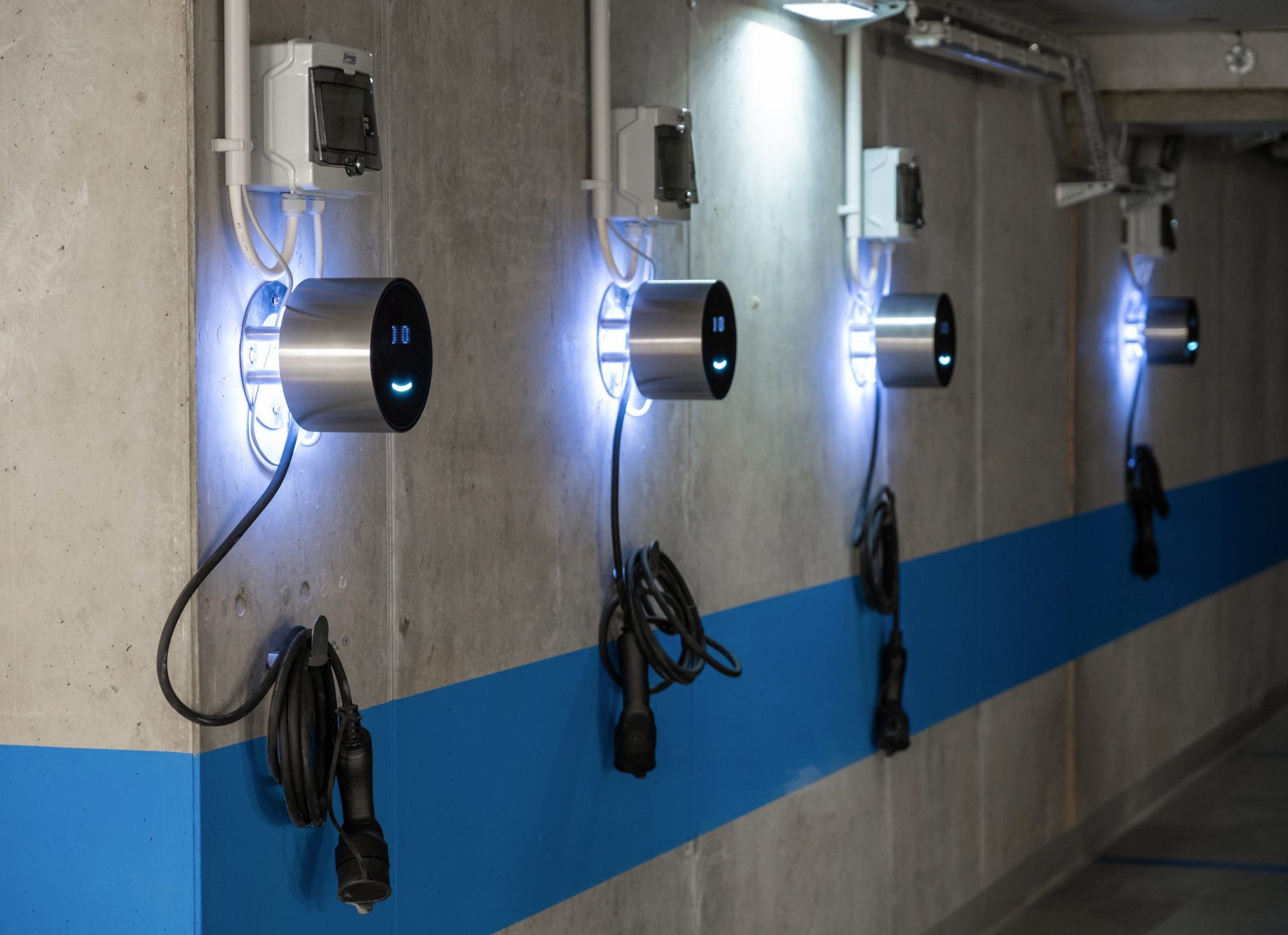 A row of live Voltie chargers in a car park
